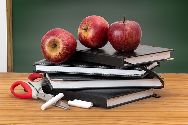school desk books apples