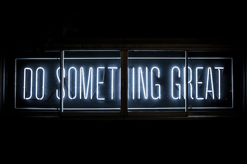 Neon sign that says Do Something Great